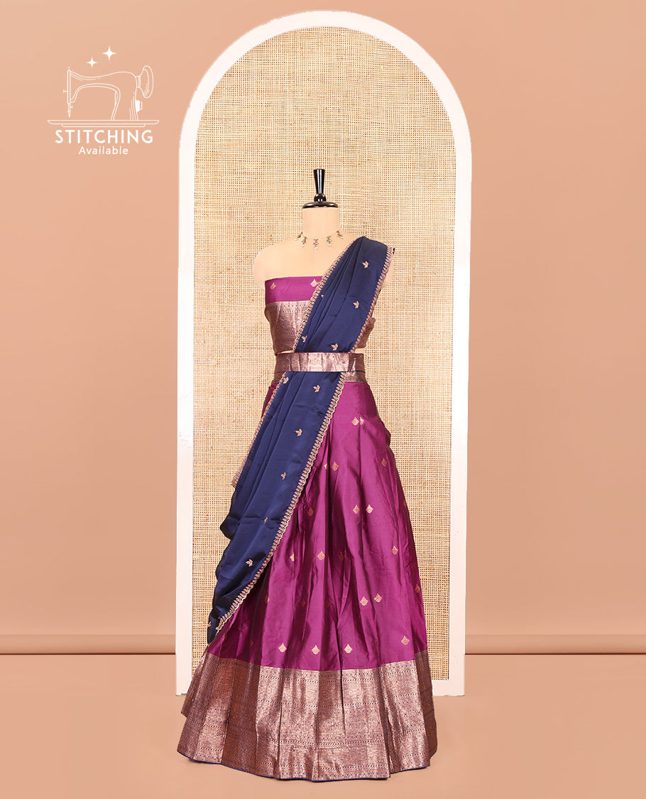 Purple and Navy Blue Semi-Banarasi Half-Saree, Bedecked with Zari Buttas on Its Skirt, Complemented by a Contrast Traditional Zari Designs Woven Border, Paired with a Matching Blouse, and a Contrast Satin Georgette Embroidered Scallop Dhavani