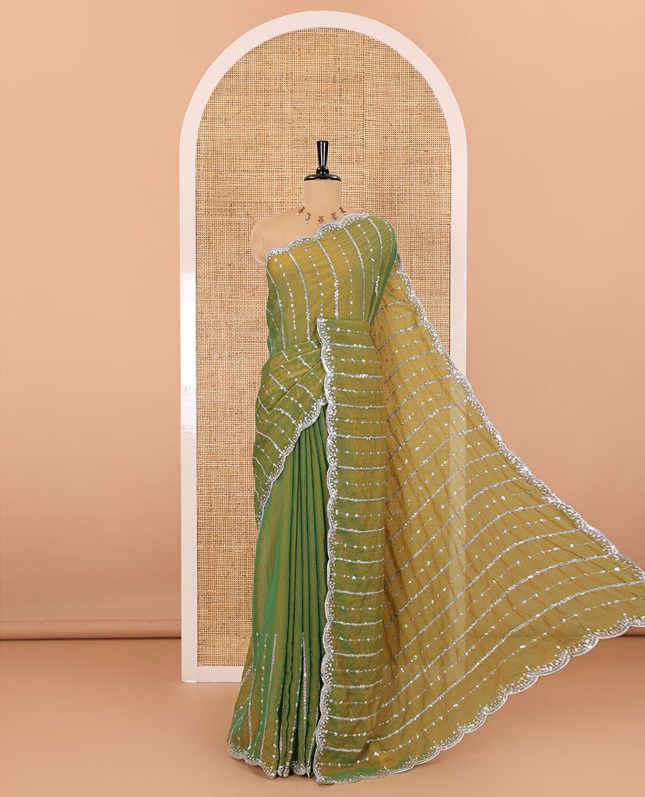 Parrot green vertical stripes embroidered shimmer chiffon saree, scallop embroidered border, embroidered pallu, and fancy embroidered matching blouse