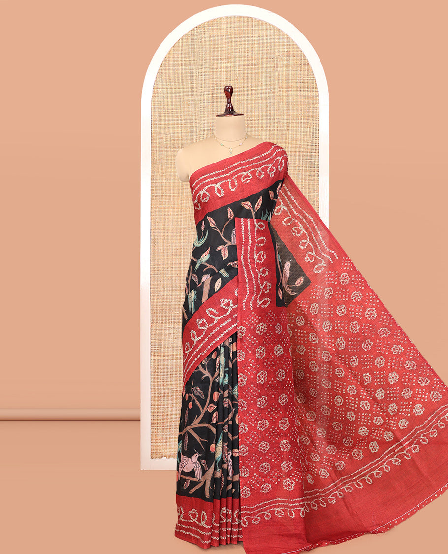 Black Fancy Tussar Saree Features Kalamkari Floral and Animal Print, Contrast Bandhani Border, Bandhani Pallu, and a Contrast Blouse