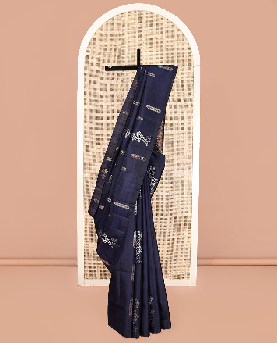 Borderless Blue Mayuri Soft Silk Saree, Gleamed Up with Zari Buttas, Highlighted by Pallu of Intricate Designs, and a Matching Blouse