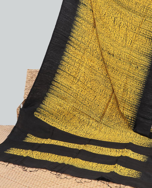 Yellow abstract design matka silk saree with contrast plain border & black abstract design pallu