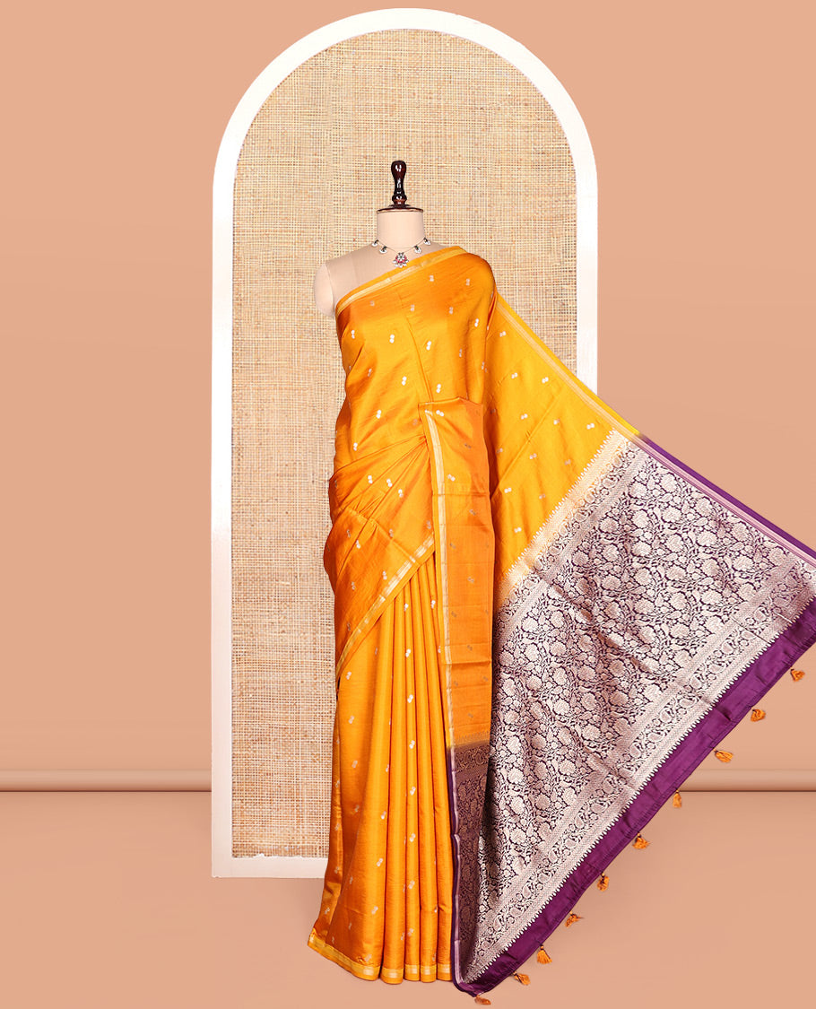Orange Satin Silk Saree, Finely Crafted with Buttas, a Subtle Piping Border, Complemented by a Contrast Floral-Paisley Jaal Pallu, and a Contrast Blouse