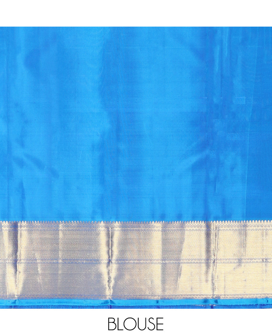 Blue Kanchipuram Designer Silk Saree, Gleamed Up with Zari Stripes, a Zari Border of Thilakam Mokku, Muthu, Rettai Neli, and Kuyil Kann Designs, Intricate Pallu, and a Matching Blouse