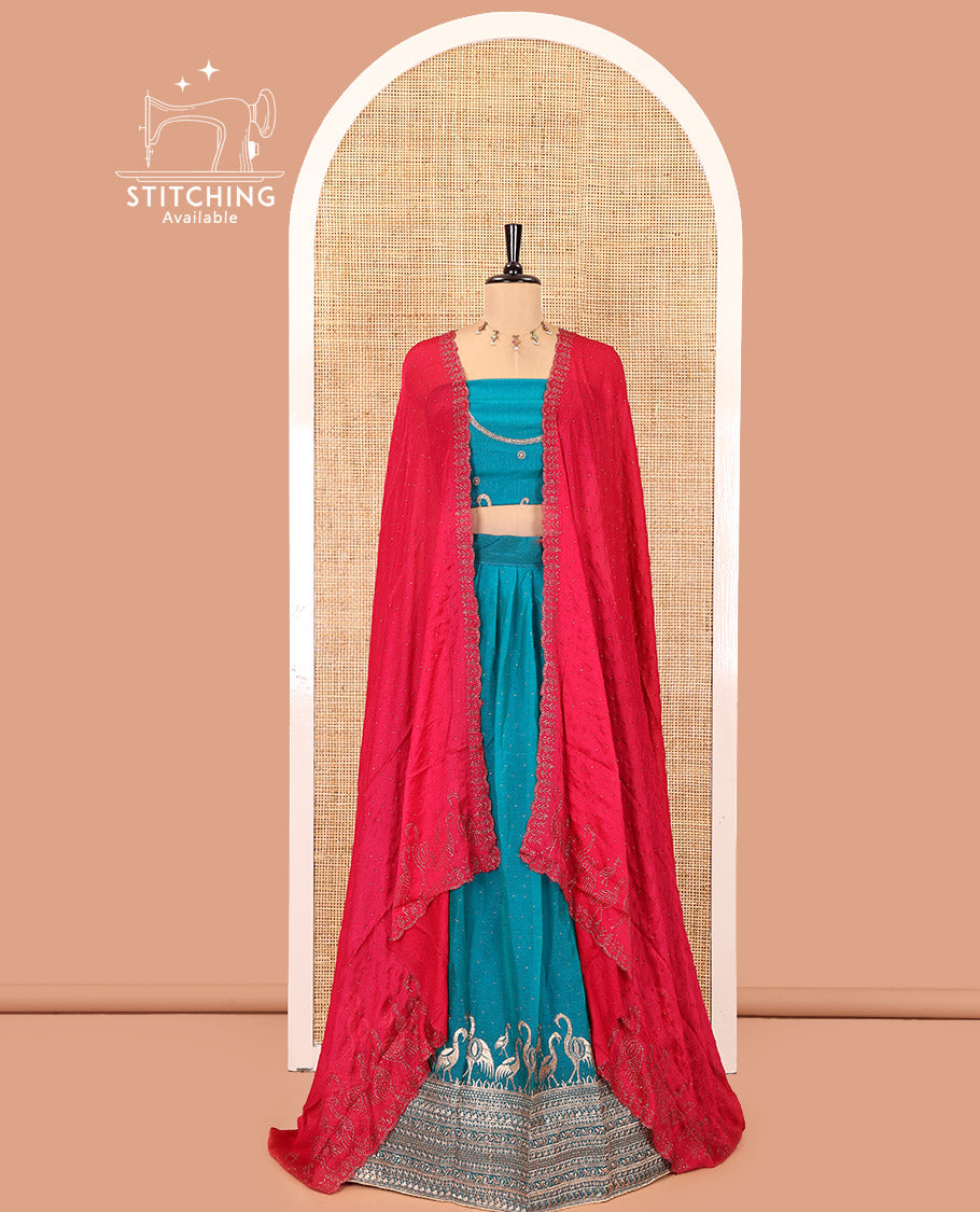 Rama Green Half-Saree Set, Gracefully Embellished with Stone Work and Bird Motifs Embroidery on Its Satin Georgette Skirt, Highlighted by Embroidered Border, Paired with a Matching Blouse, and Comes with a Contrast Scallop Stone Work Dupatta