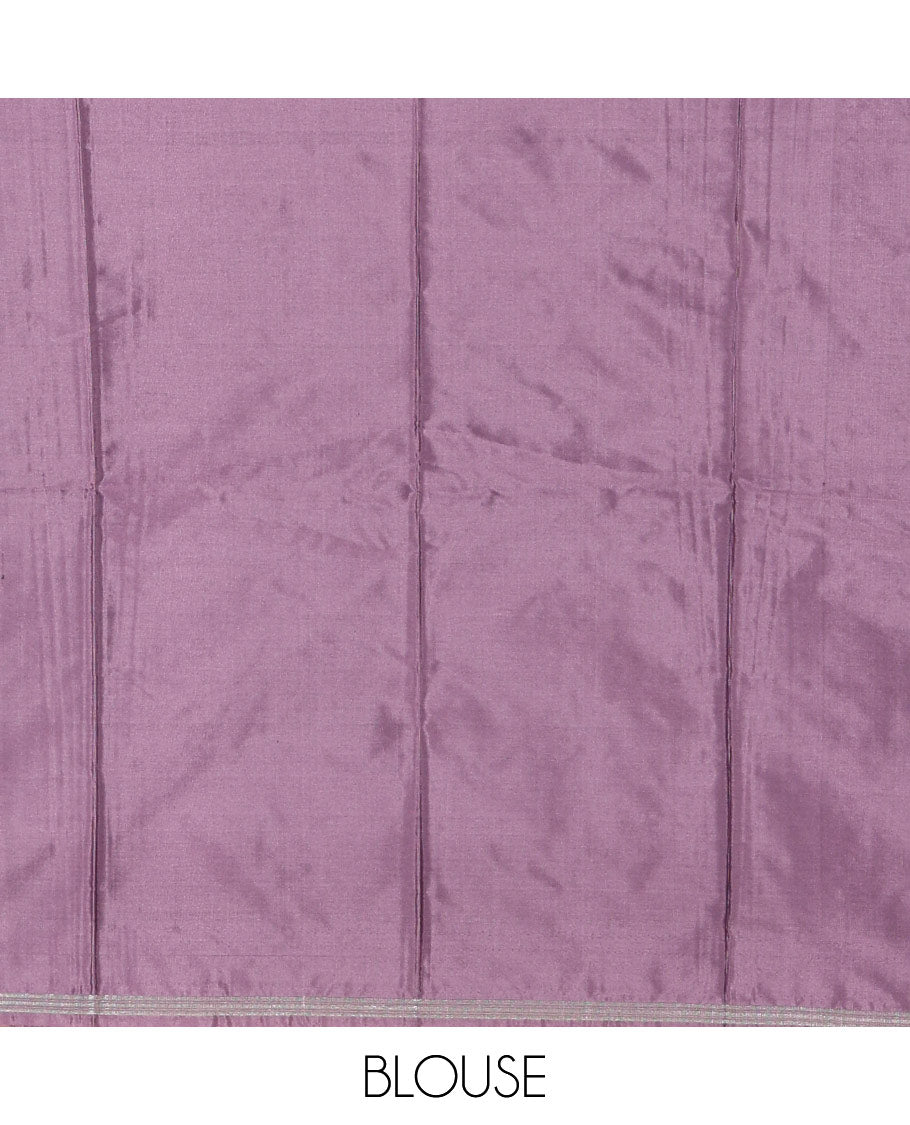 Light voilet half-saree, buttas with self-bordered taffeta silk skirt, a plain blouse, and a contrast round butta bordered satin georgette dhavani