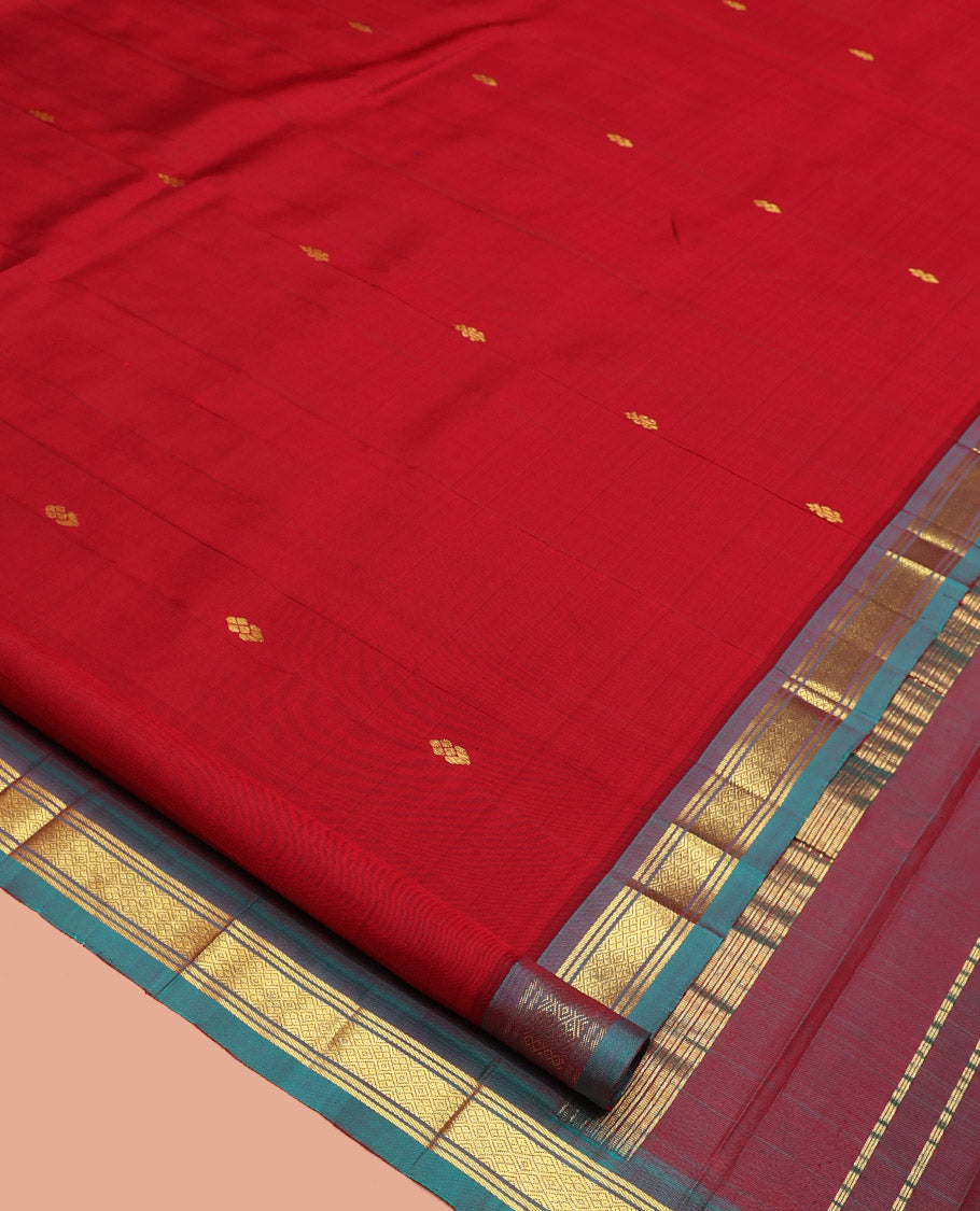 Red Kanchipuram Silk Saree, Woven with Zari Buttas, a Contrast One-Sided Border of Jaal Designs, a Zari-Design Pallu, and No Blouse