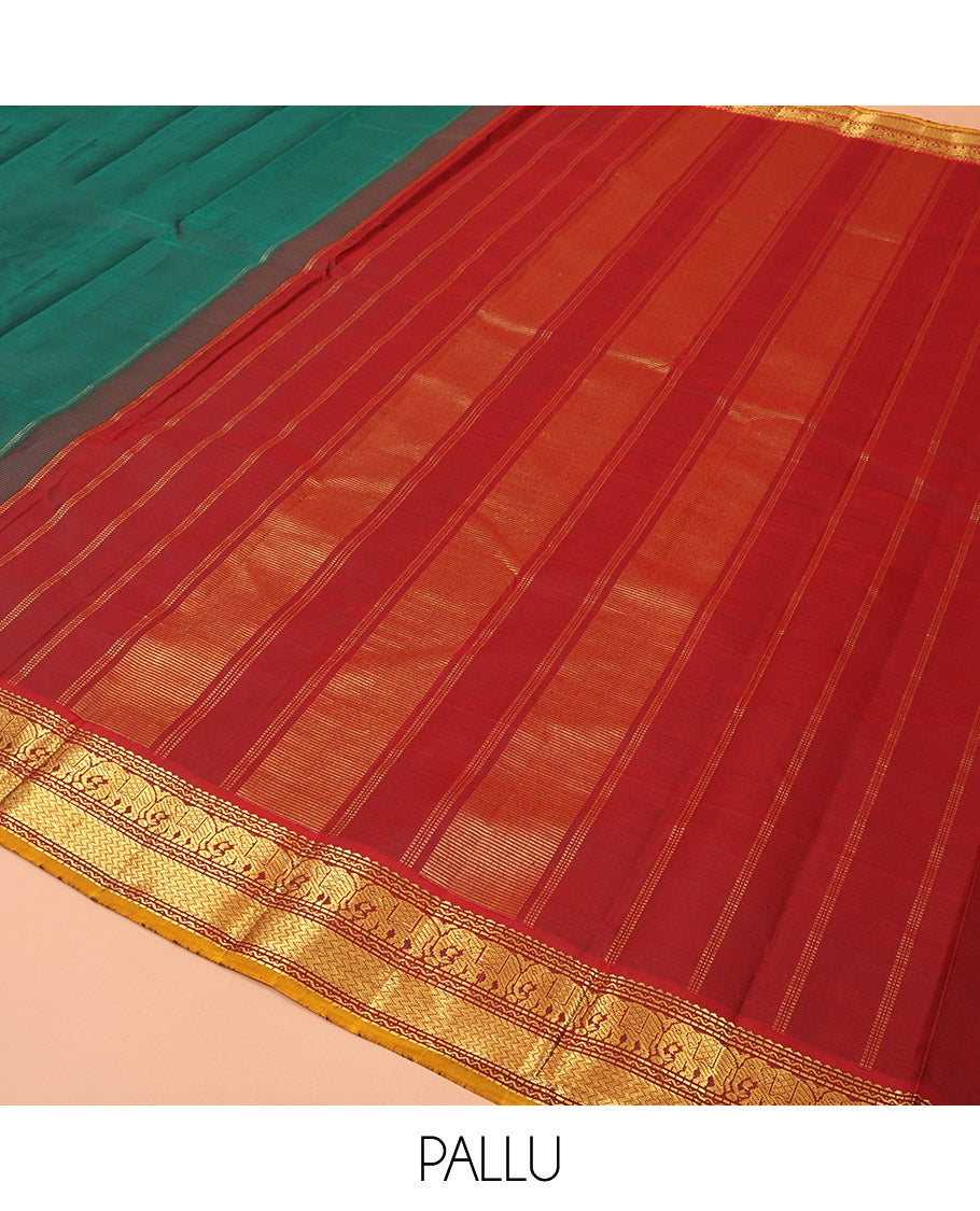 Green Plain Kanchipuram Silk Saree, Complemented by a Contrast Border Featuring Rekku, Muthu, Neli, Yaanai, and Vanki Designs, Gleaming Zari Pallu, and Paired with a Contrast Blouse