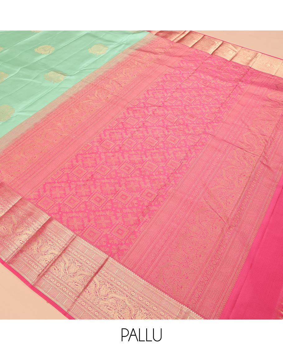 Green Vasundhara Silk Saree, Delicately Woven with Zari Buttas, Contrast Border of Thilakam, Kathir, Mayil Kann, Cross Kamalam, and Yaali Designs, Grand Pallu, and Contrast Blouse