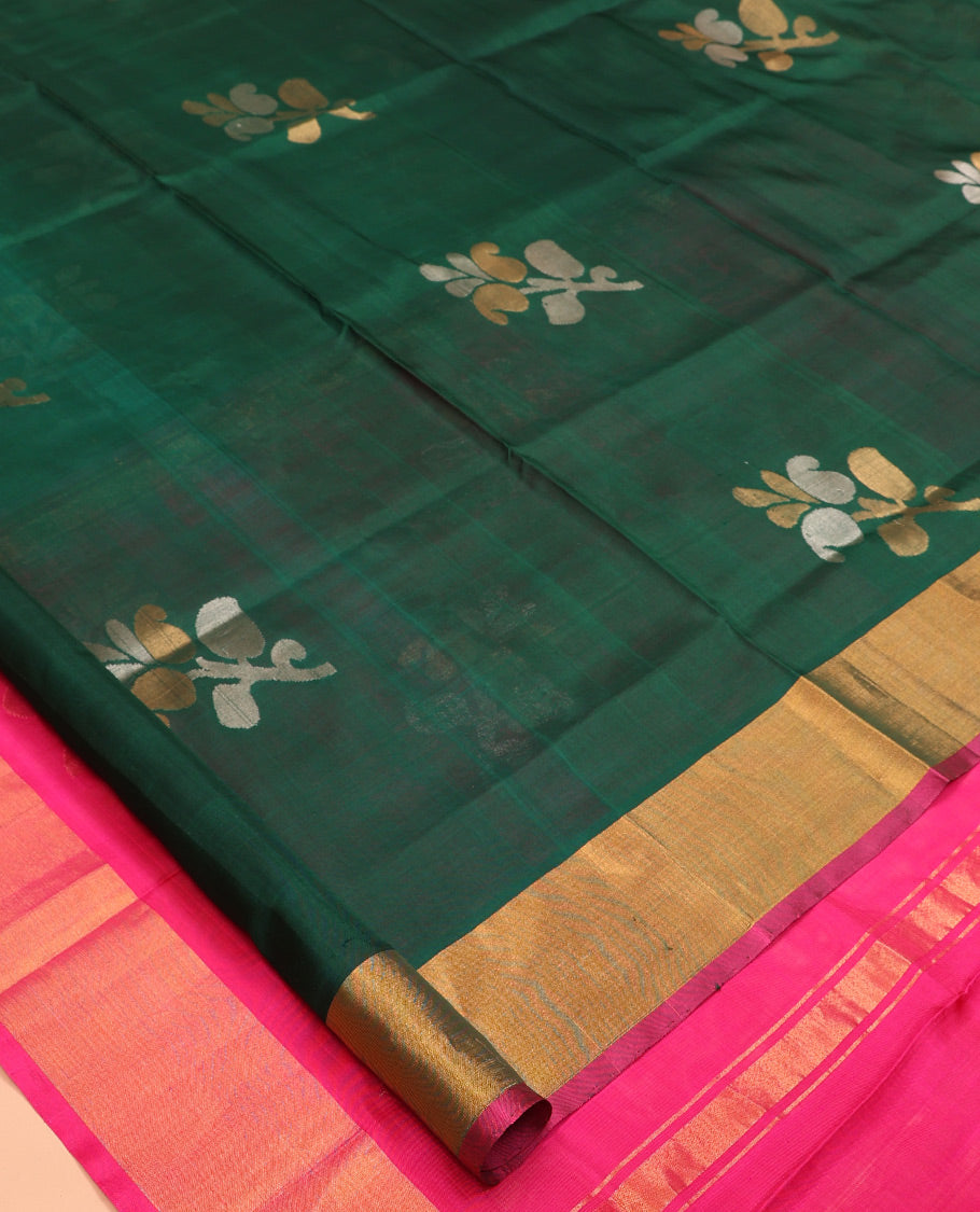 Green Uppada Silk Saree, Accentuated with Floral Vine Zari Buttas, Complemented By Contrast Bavanji Border, Pallu of Floral Buttas and a Contrast Blouse