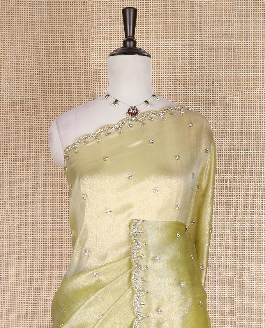 Green kardana and stone embroidered designer saree, scallop kardana and stone embroidered border