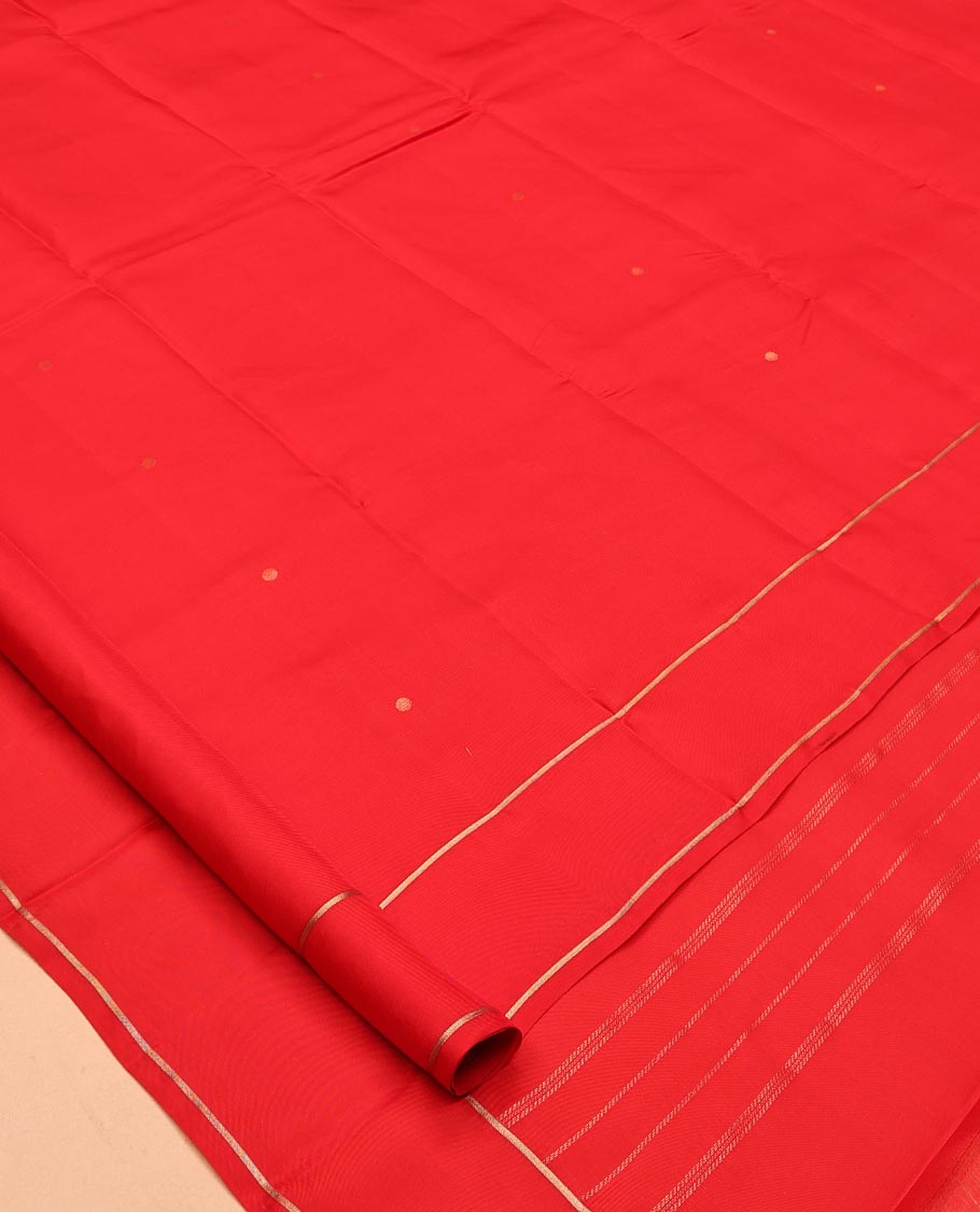 Red Vasundhara Lite Silk Saree, Subtly Sparkled with Paisa Zari Buttas Across Its Body, Highlighted Zari Border of Horizontal Stripes, Gleaming Pallu of Seppu Rekku Designs, and Paired with a Matching Blouse