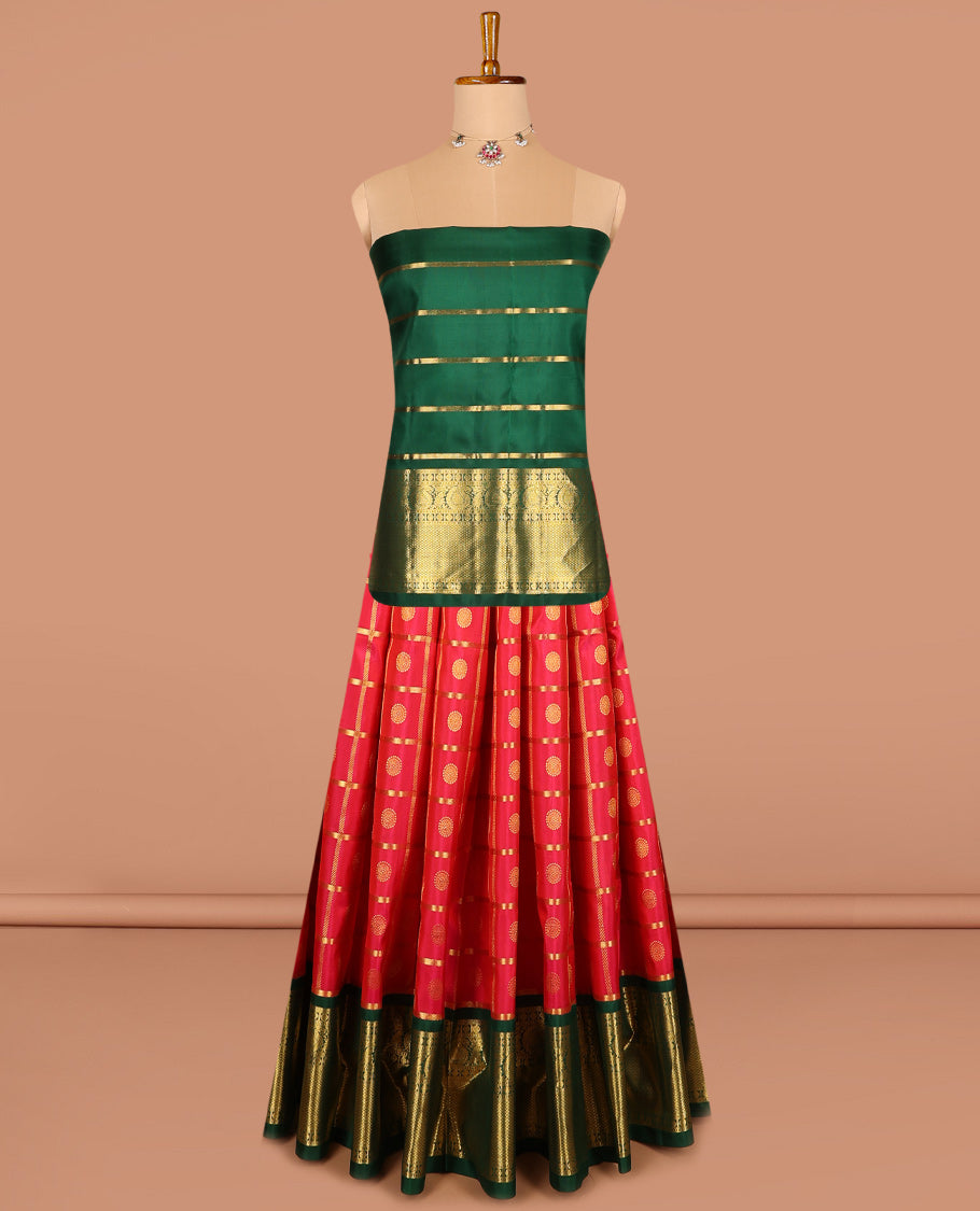 Red pure silk half-saree, chakram enclosed zari checked skirt, contrast border of muthu, poun, arumbu manga and mayil kann, and contrast zari design blouse, and leaf jaal dhavani