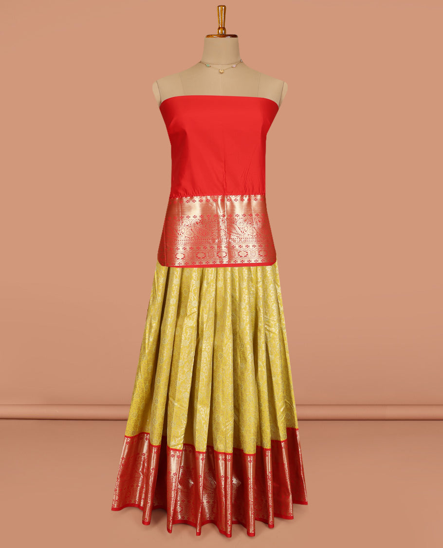 Leaf Green Art Silk Pavadai Material, Accentuated with Jacquard Design, Contrast Traditional Zari Design Border, and a Contrast Blouse