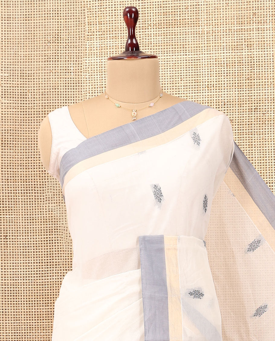 White Kanchi Cotton Saree, Woven with Thread Buttas, a Contrast Border, Intricate Pallu, and a Matching Blouse