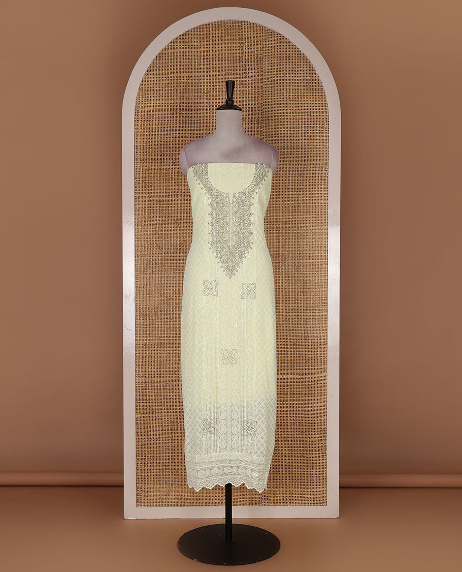 Lime yellow material churidar set, stone work with Schiffli style embroidered georgette top, American Crape bottom, and polka dotted printed mirror work dupatta