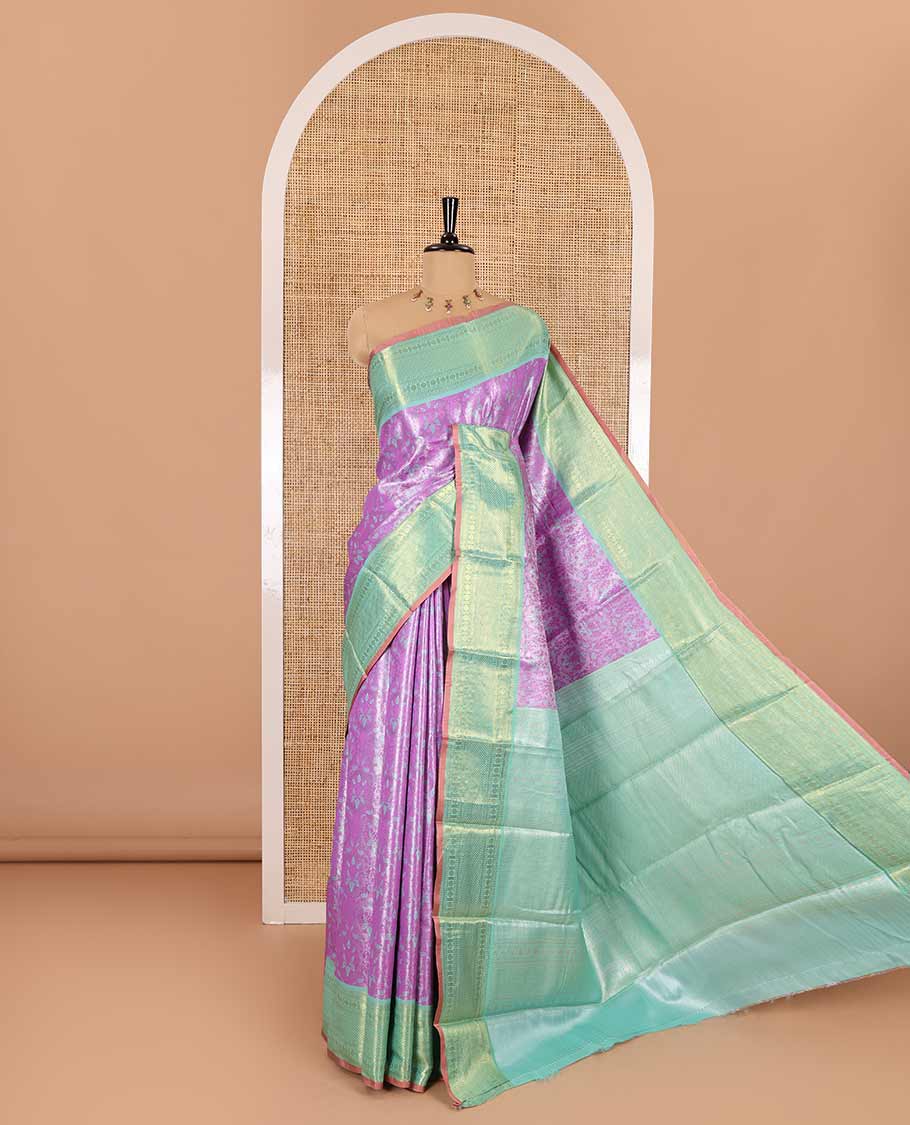 Lavender floral jacquard Kanchi tissue saree, contrast traditional zari design border, gleaming pallu, and a contrast jacquard blouse