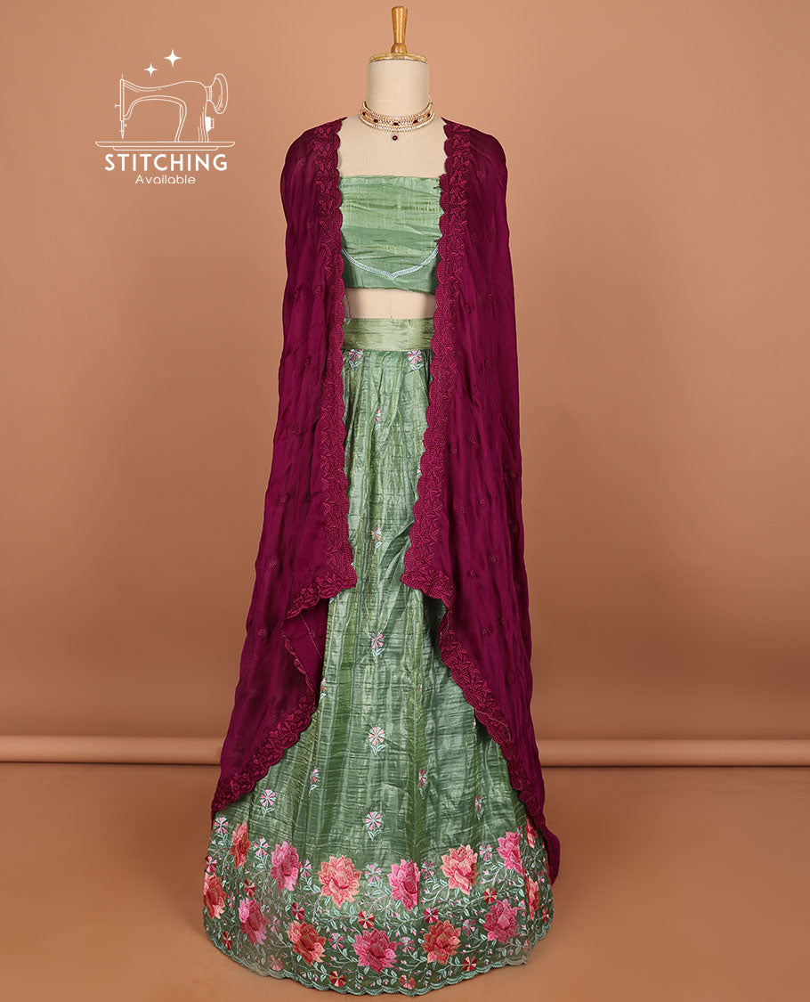 Green buttas half saree with contrast border , zari design blouse & floral buttas , scallop border dhavani