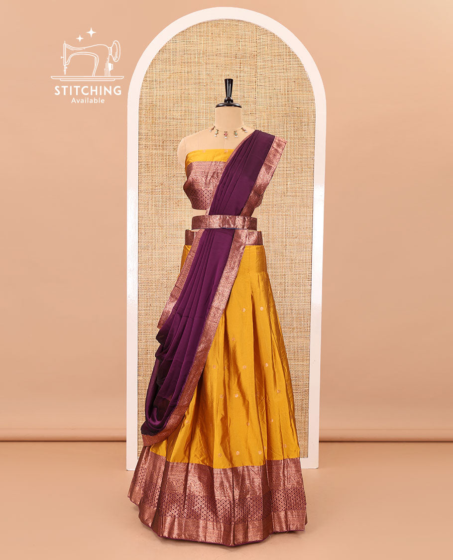Mustard-wine taffeta half-saree, zari buttas with contrast traditional zari bordered skirt, a matching blouse, and contrast zari border dhavani with belt