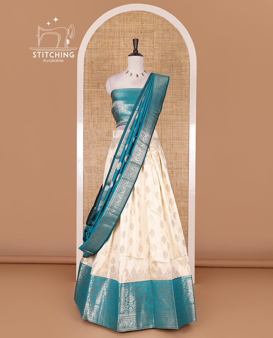 Cream with rama green semi-banarasi half-saree, zari buttas with contrast traditional zari border skirt, zari jacquard blouse, and zari design dhavani