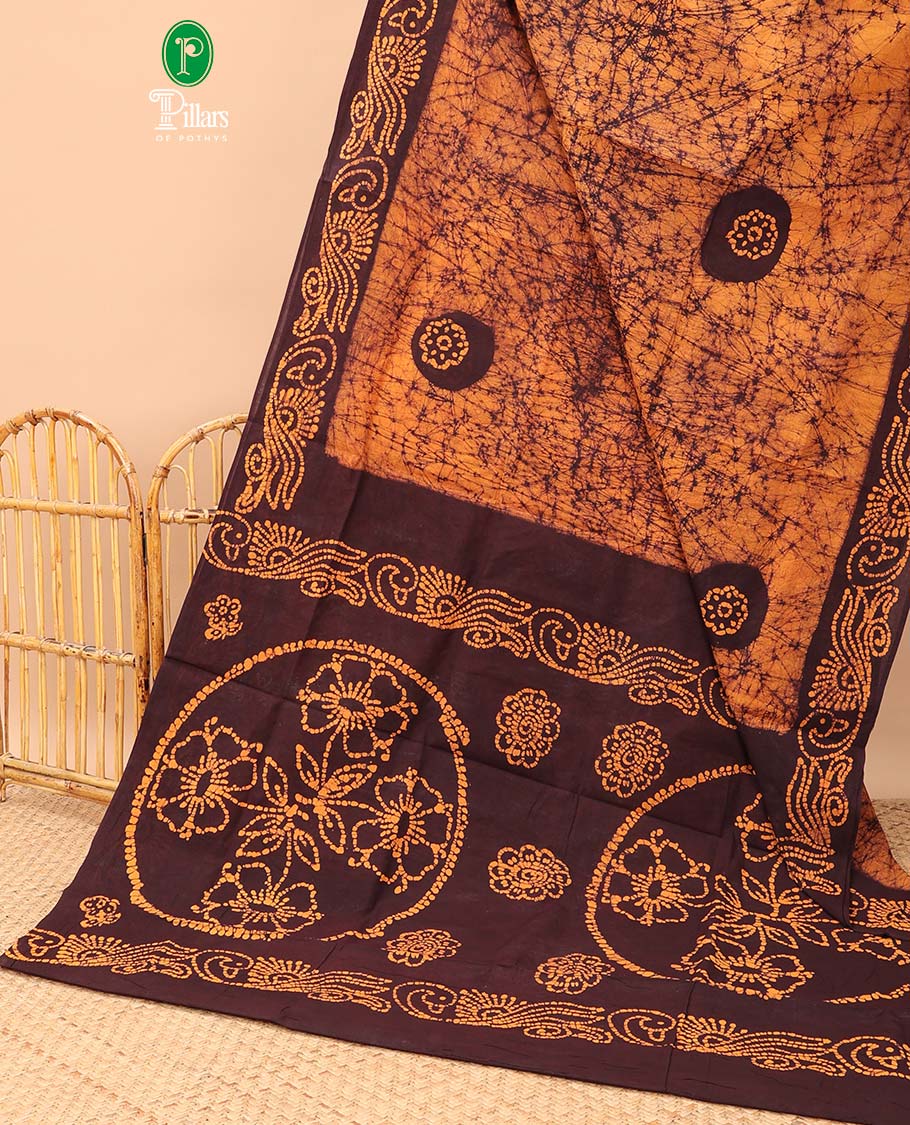 Brown pathik printed sungudi cotton saree with pathik printed contrast border & pathik printed rich pallu along with pathik printed blouse