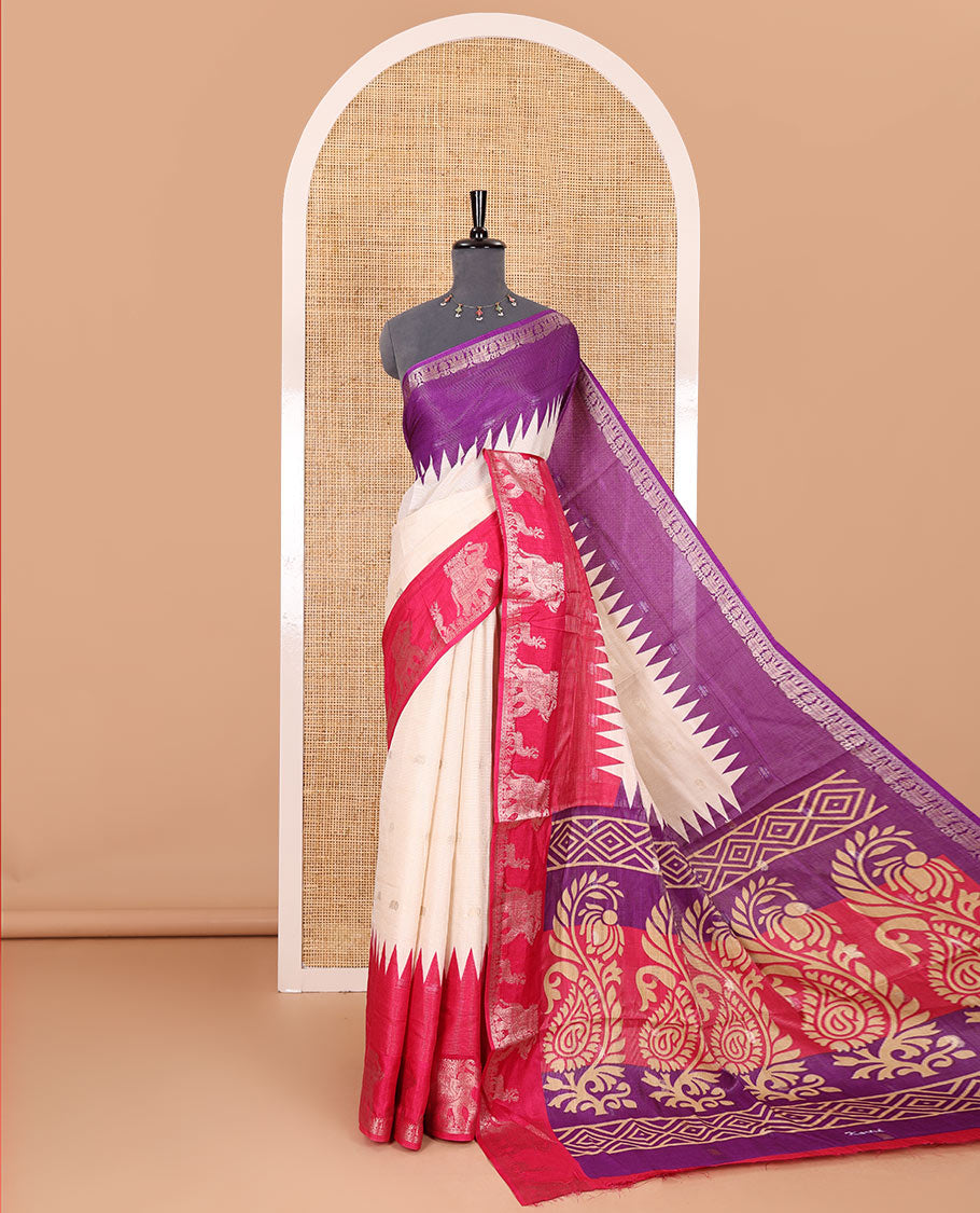 Half-white zari stripes and buttas dola silk saree, contrast pink-purple Ganga-Jamuna temple elephant motifs border, paisleys printed pallu, and contrast elephant buttas blouse