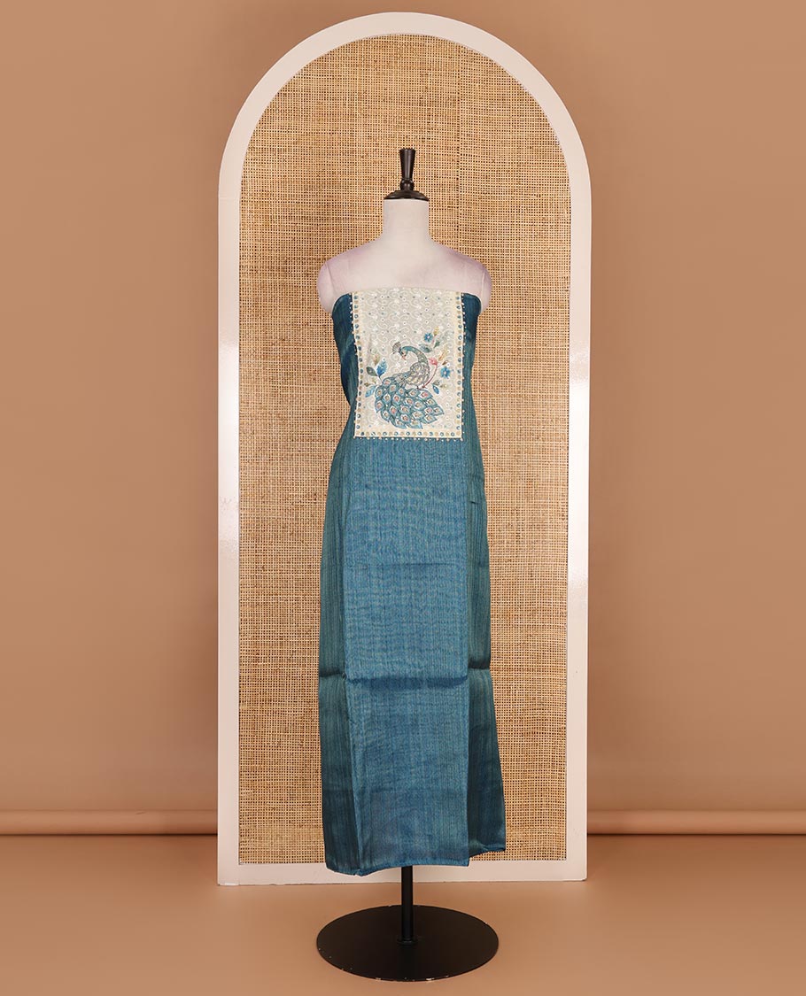 Green tissue material chudidar set, peacock printed with neck patch embroidered top, plain bottom, dupatta of peacock print, and cut work