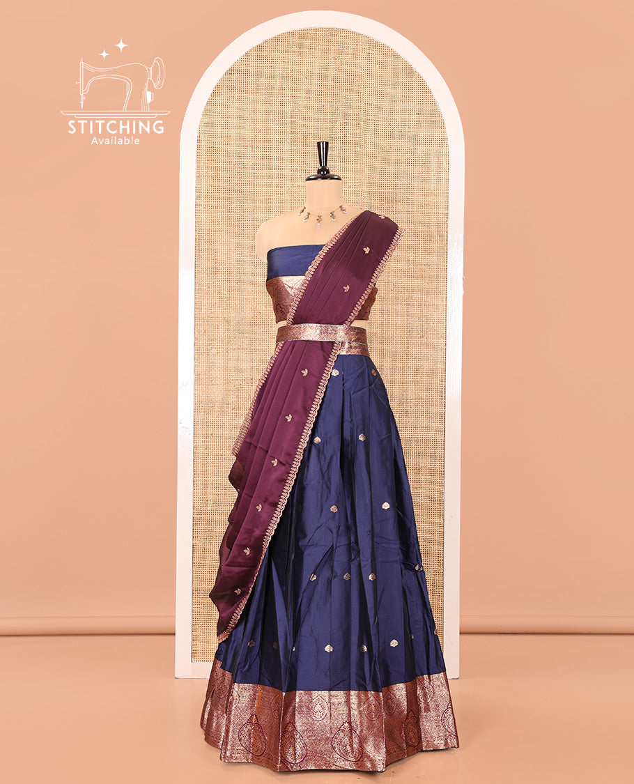 Blue and Purple Semi-Banarasi Half-Saree, Elevated with Zari Buttas on Its Skirt, Complemented by a Contrast Intricately Zari-Designed Border, Paired with a Matching Blouse, and a Contrast Satin Georgette Embroidered Scallop Dhavani