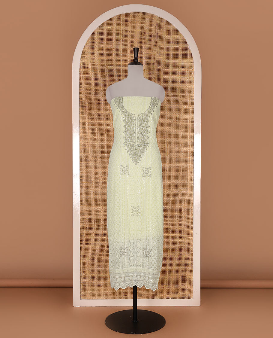 Lime yellow material churidar set, stone work with Schiffli style embroidered georgette top, American Crape bottom, and polka dotted printed mirror work dupatta