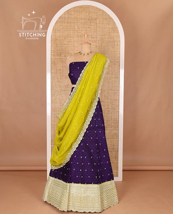 Violet half-saree, floral motifs embroidered semi raw silk top, matching embroidered blouse, and contrast scallop embroidered georgette dhavani