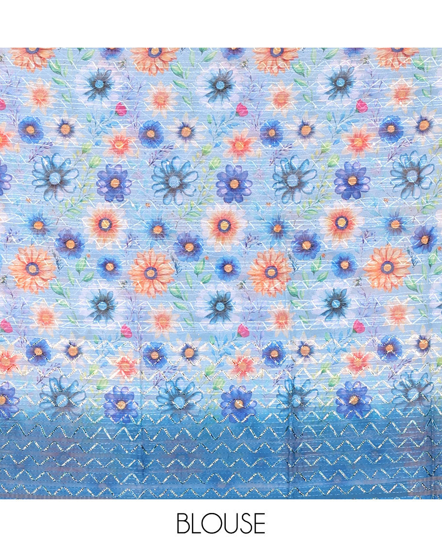 Borderless blue sparkling glitter russel net saree with self-pallu, and a contrast floral printed and zig-zag patterned blouse