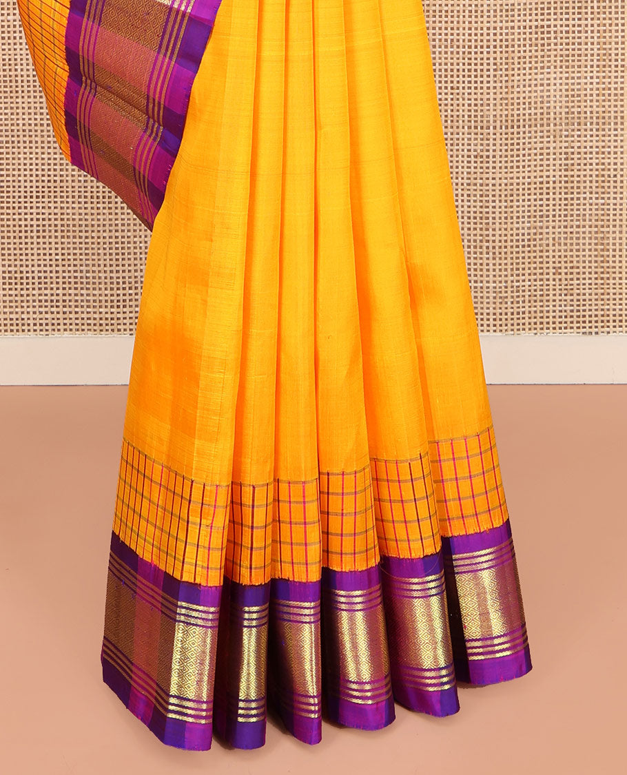 Yellow Kanchipuram Silk Saree, Bedecked with Zari Buttas on Its Body, Complemented by Contrast One-Sided Korvai Border of Banaras, and Mayil Kann Designs, Pallu Features Zari Designs, and Comes Without a Blouse
