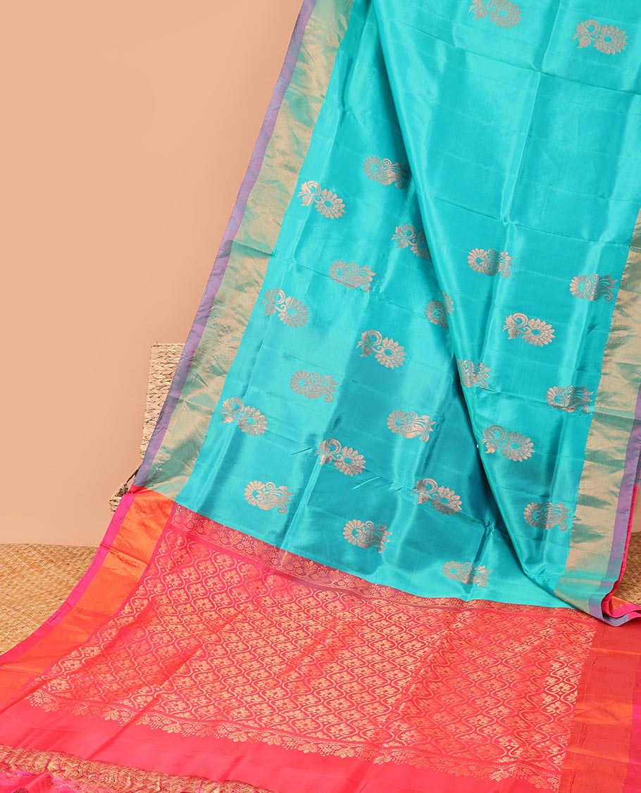 Blue with floral motifs semi-uppada saree with contrast zari border & zari jaal design pallu
