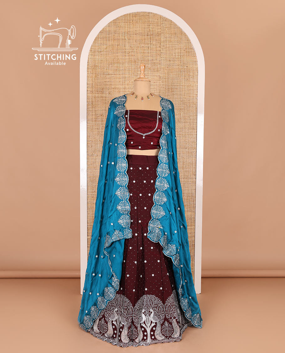 Wine half-saree, buttas, tree, and peacock motifs embroidered semi-taffeta silk top, matching blouse, and contrast scallop embroidered dhavani