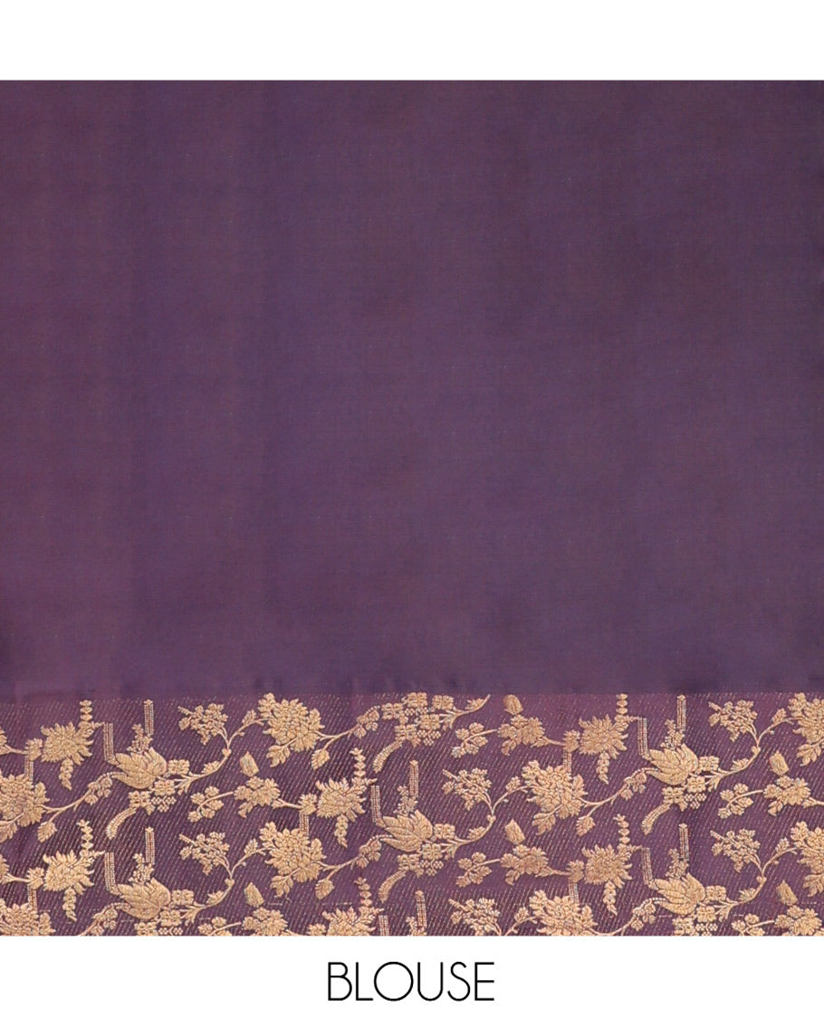 Lavender Vasundhara Silk Saree, Ornamented with Zari Buttas on Its Body, Complemented by Contrast Zari Border of Floral Jaal Designs, Gracefully Embellished Pallu of Floral Jaal Designs, and Paired with a Contrast Blouse