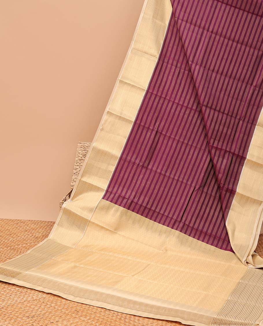 Maroon striped vasundhara elite silk saree with contrast striped zari design border & intricate zari design pallu