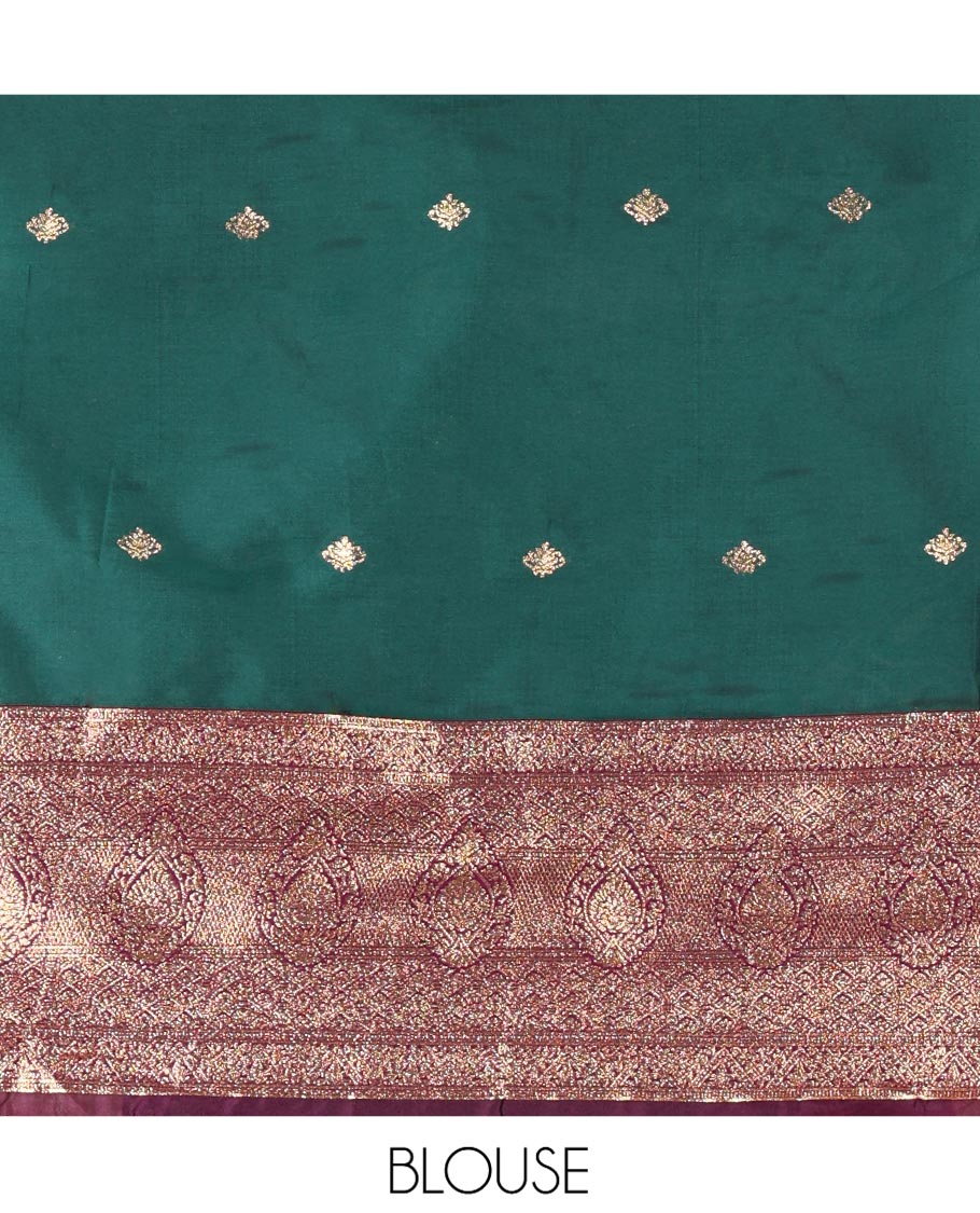 Green and Purple Semi-Banarasi Half-Saree, Adorned with Zari Buttas on Its Skirt, Complemented by a Contrast Traditional Zari Designs Woven Border, Paired with a Matching Blouse, and a Satin Georgette Embroidered Scallop Dhavani