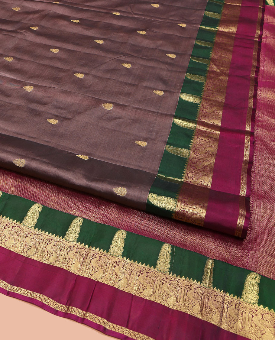Brown Vasundhara Lite Silk Mix Saree, Graced with Zari Buttas All Over Its Body, Complemented by a Contrast Rettai Pettu Border of Manga, Rekku, Mayil, and Kamalam Designs, Grandly Woven Pallu, and Paired with a Contrast Blouse