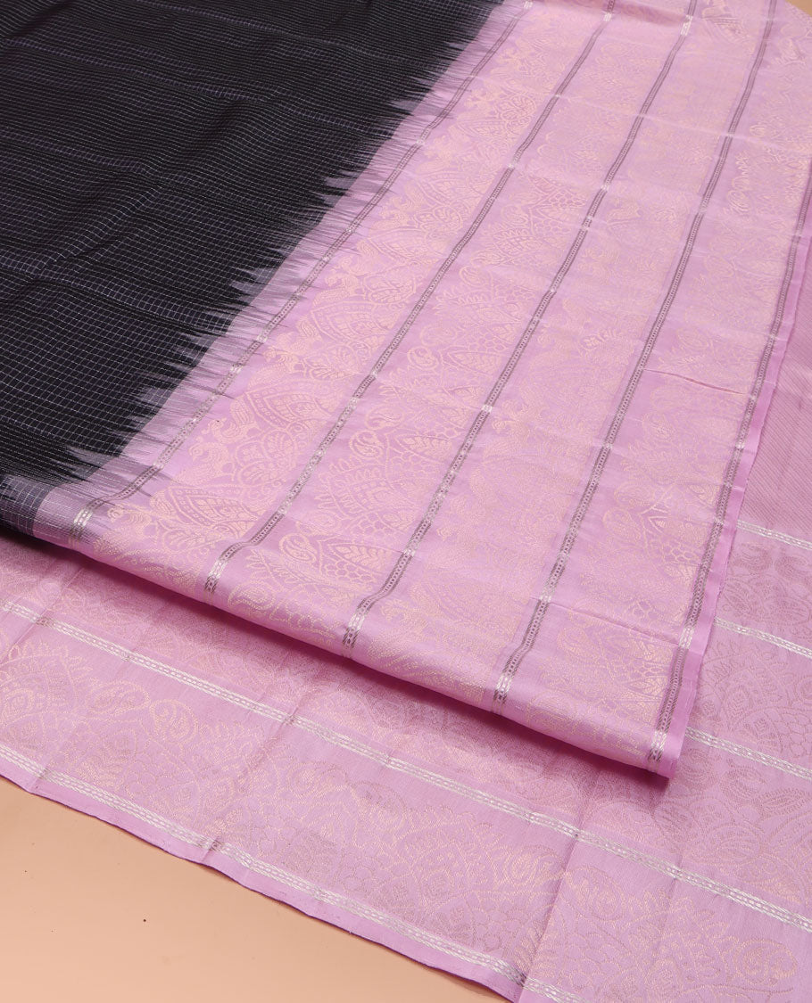 Black Vasundhara Silk Saree, Decked Up with Micro-Checked All Over Its Body, Complemented by Contrast Border of Beautiful Peacock Designs, Pallu Mirrors the Same Designs, and Paired with a Contrast Blouse