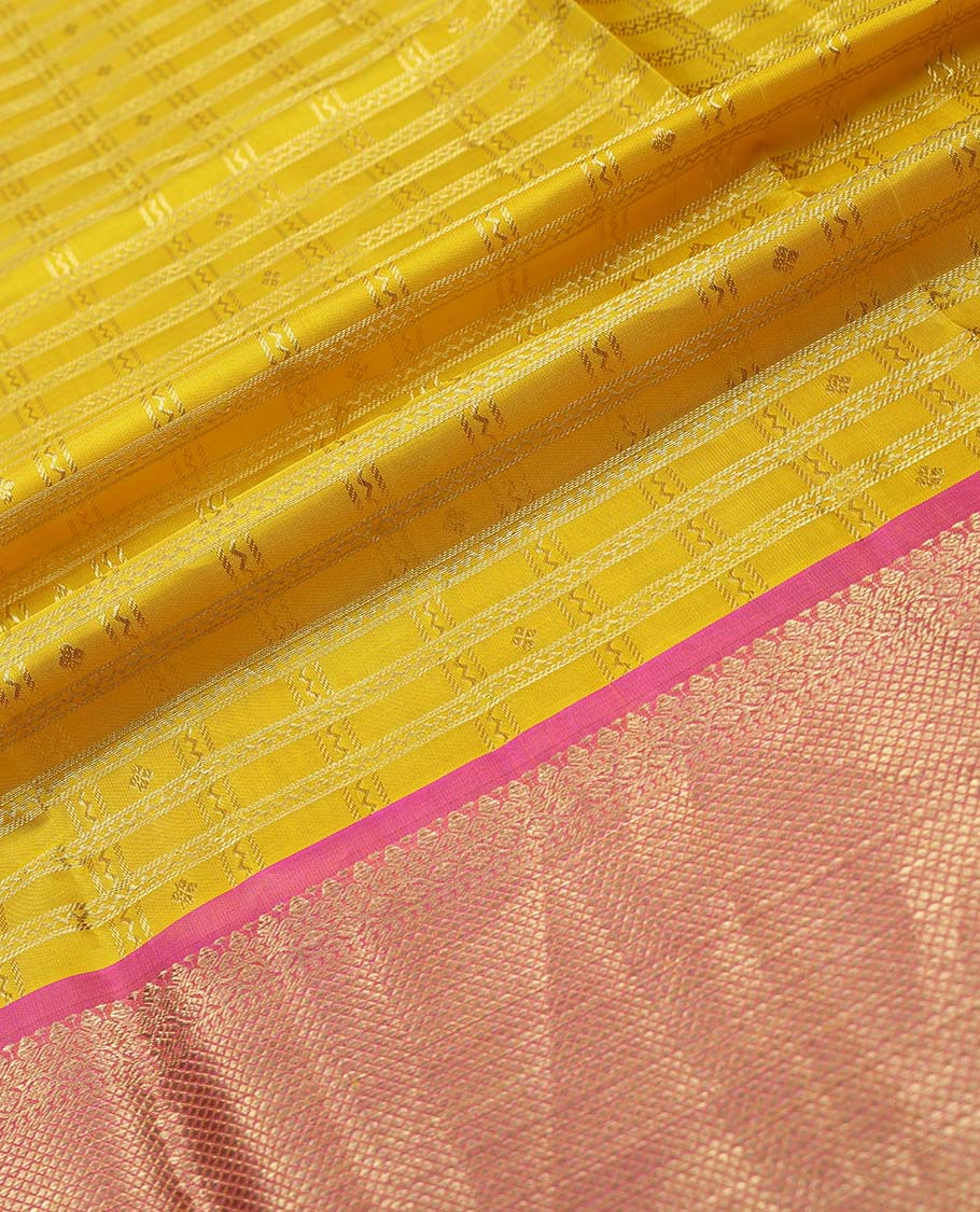 Yellow checked pure silk half saree with contrast zari design border, zari design blouse & floral zari design dhavani