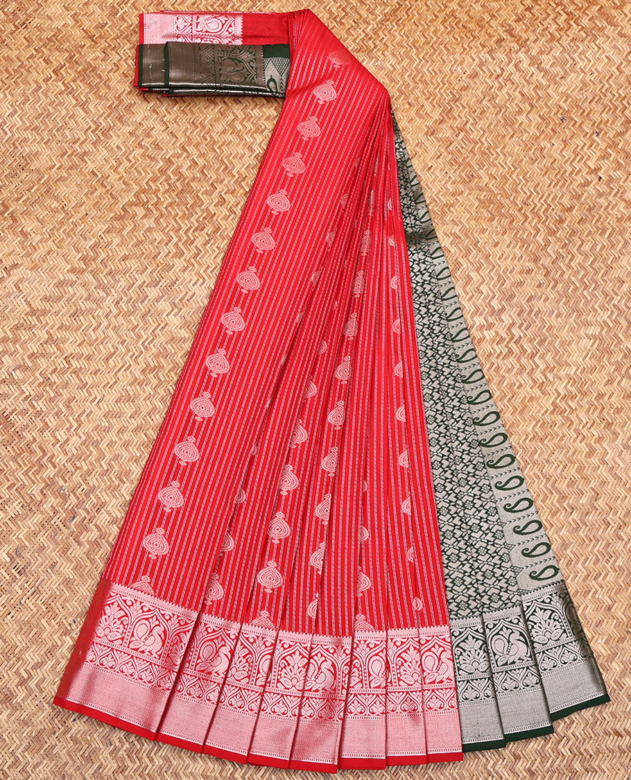 Red Budget Silk Saree, Impeccably Styled with Zari Buttas All Over Its Body, Highlighted by Traditional Zari Design Border, Complemented by Contrast Intricately Designed Pallu, and Paired with a Contrast Blouse