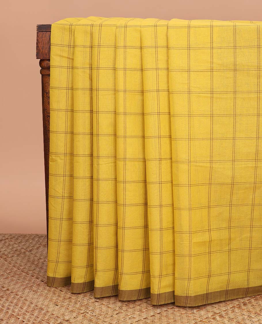 Mustard checked Mangalagiri cotton saree, contrast striped border, striped pallu, and a contrast kalamkari floral printed blouse