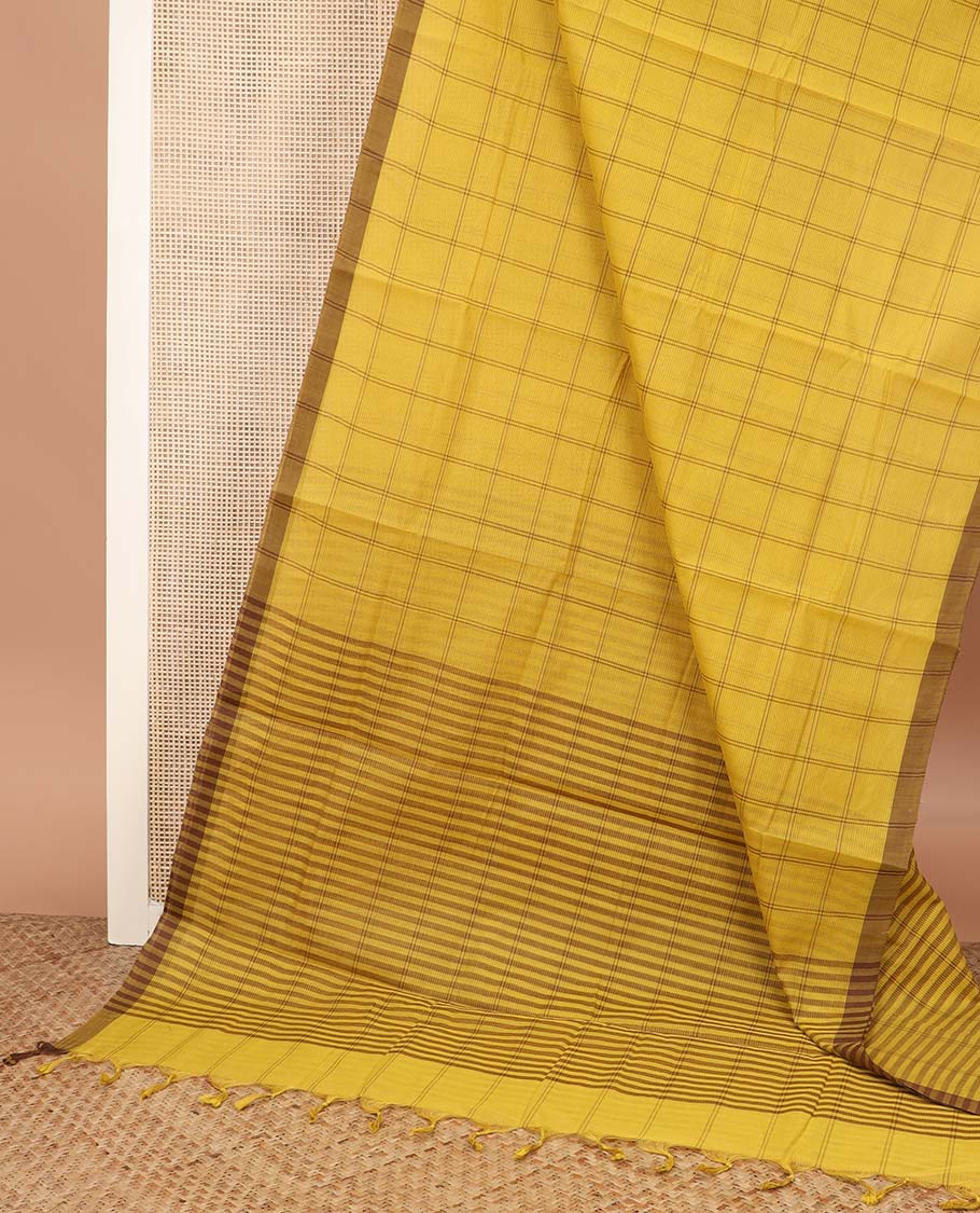 Mustard checked Mangalagiri cotton saree, contrast striped border, striped pallu, and a contrast kalamkari floral printed blouse