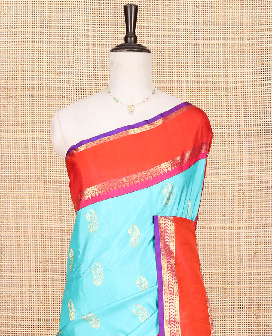 Blue Gadwal Silk Saree, Gracefully Embellished with Paisley Buttas, Complemented by a Contrast Traditional Zari Double-Pet Border, Grand Pallu, and a Contrast Blouse
