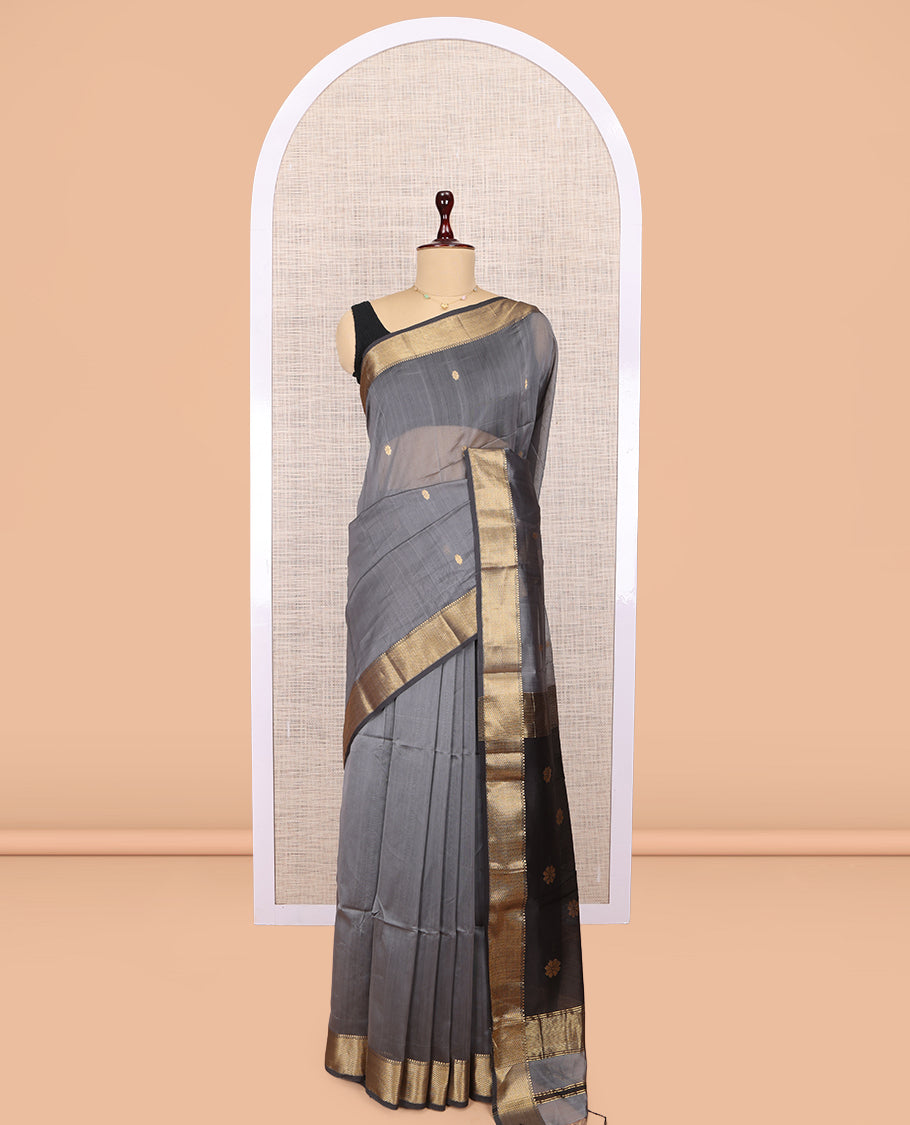 Grey Maheshwari Cotton Saree, Embellished with Buttas, Highlighted by a Traditional Zari Border, Pallu Gleamed Up with Zari Buttas, and a Contrast Blouse