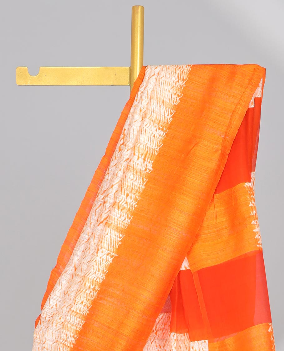 Cream abstract design matka silk saree with contrast plain border & orange abstract design pallu