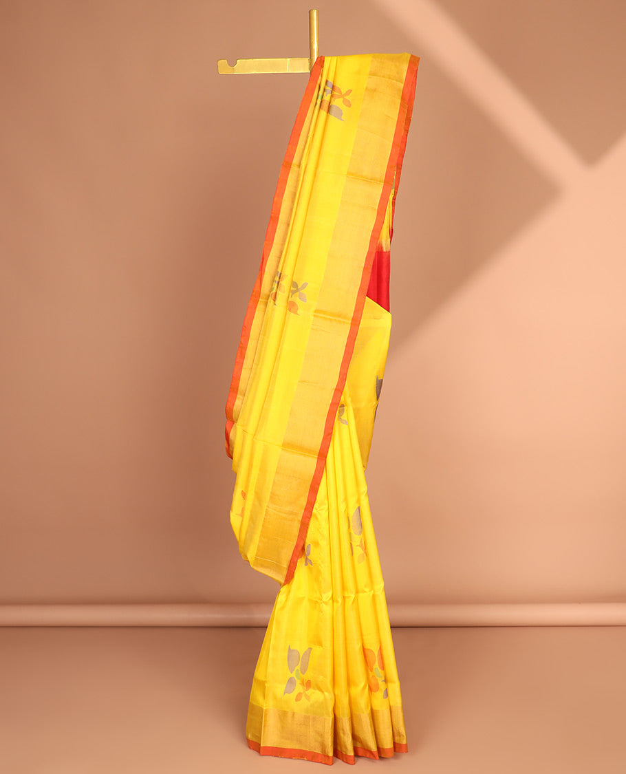 Yellow uppada saree with floral buttas, contrast plain border & pallu of floral designs
