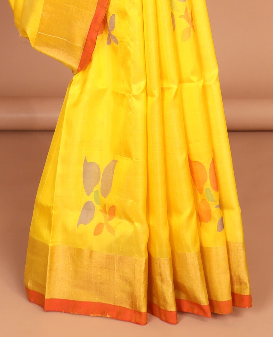 Yellow uppada saree with floral buttas, contrast plain border & pallu of floral designs