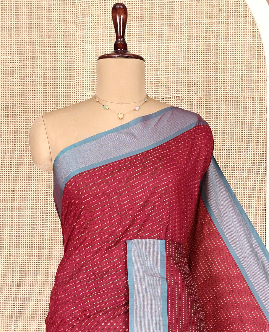 Red Aarani Gift Saree, Steeped with Buttas on Its Body, Complemented by a Contrast Border, a Self-Pallu of Stripes, and Paired with a Matching Blouse