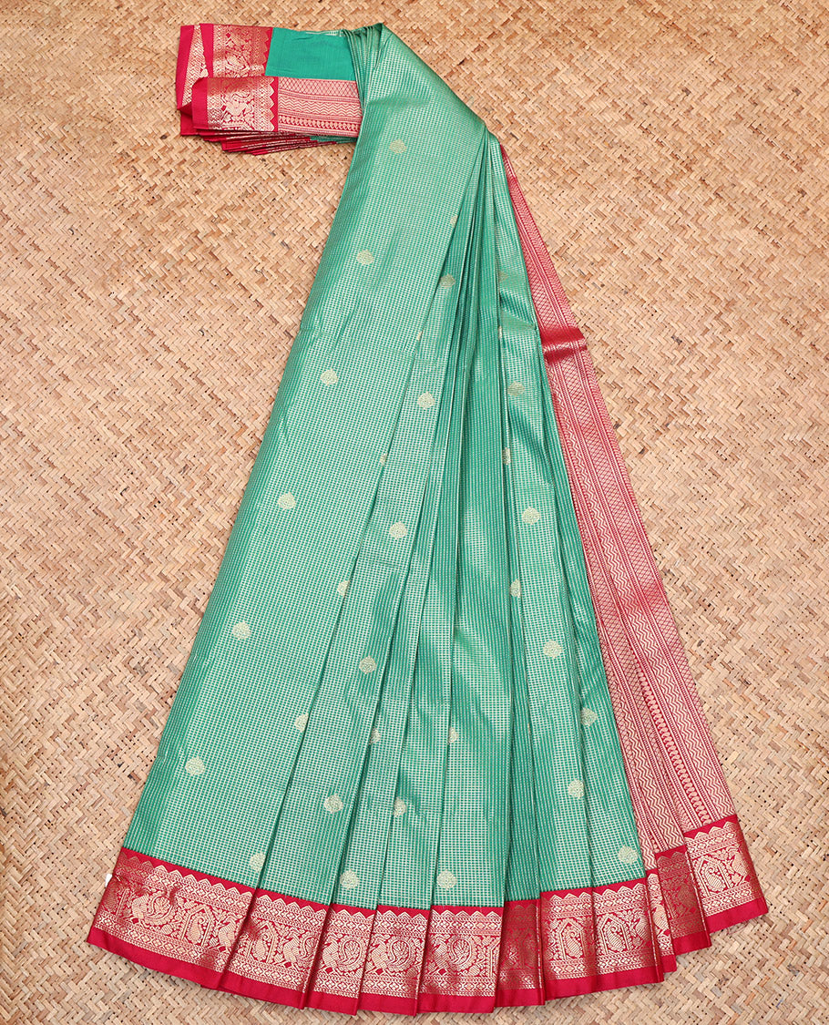 Green Budget Silk Saree, Ornamented with Zari Buttas and Micro-Checks, Complemented by a Contrast Traditional Zari Border, Geometric-Patterned Pallu, and a Contrast Blouse