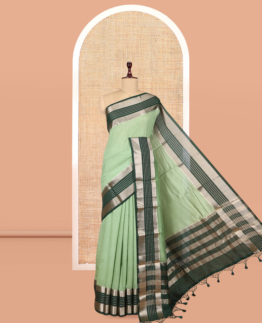 Green Plain Assam Silk Saree, Complemented by Contrast Traditional Zari Border, Zari Woven Pallu, and Contrast Blouse